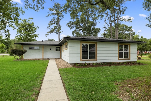 606 Clayton St, Tomball, TX 77375 - ranch-style home featuring a front yard