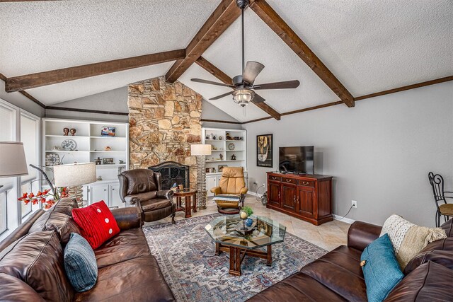 3706 Autumn Ln, Baytown, TX 77521 - living area featuring a textured ceiling, a ceiling fan, baseboards, a fireplace, and built in shelves