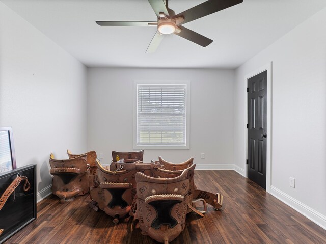 14624 Dove Ln, Needville, TX 77461 - sitting room featuring wood finished floors, ceiling fan, and baseboards