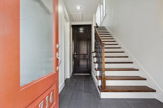 5714 Kansas St, Houston, TX 77007 - foyer entrance with stairs, recessed lighting, and baseboards