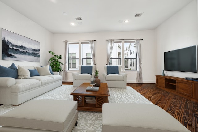 5714 Kansas St, Houston, TX 77007 - living room with wood finished floors, recessed lighting, and baseboards