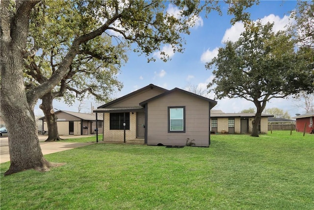 1916 Holloman Dr, Port Lavaca, TX 77979 - view of front facade with brick siding