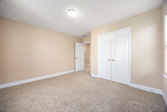 4911 Lattimore Creek Dr, Houston, TX 77084 - unfurnished bedroom featuring carpet flooring, baseboards, and a closet