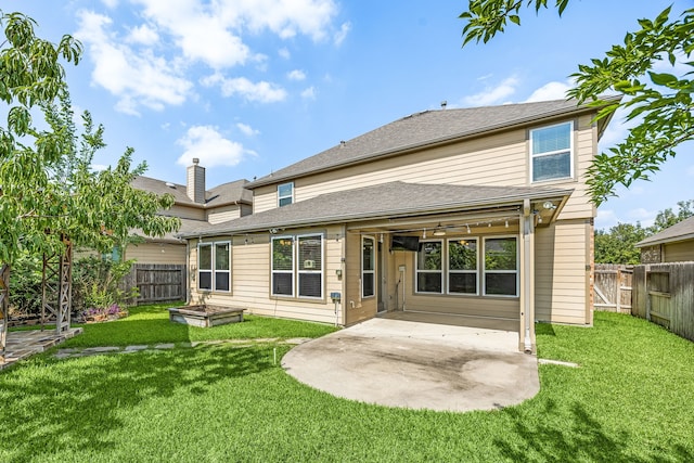 4911 Lattimore Creek Dr, Houston, TX 77084 - back of property with a patio area and ceiling fan