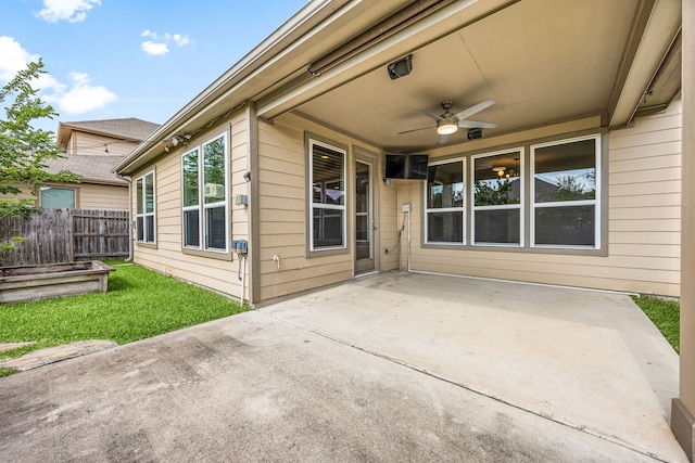 4911 Lattimore Creek Dr, Houston, TX 77084 - view of patio featuring ceiling fan