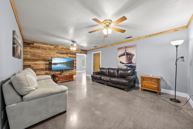 1307 Hillcrest Dr, Granite Shoals, TX 78654 - living area featuring wood walls, a ceiling fan, concrete flooring, and baseboards