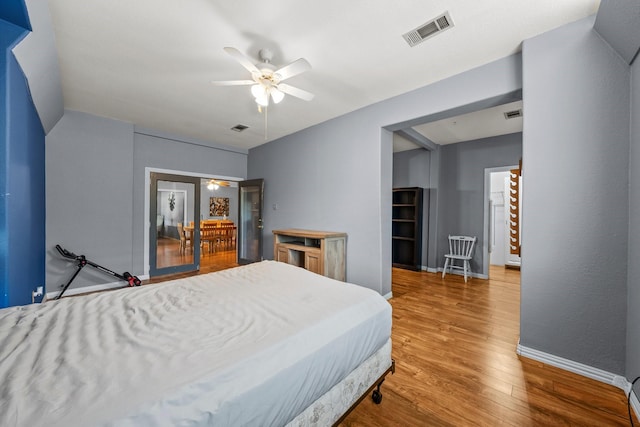 1307 Hillcrest Dr, Granite Shoals, TX 78654 - bedroom featuring wood finished floors, baseboards, and a ceiling fan