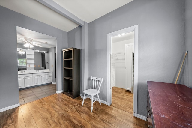 1307 Hillcrest Dr, Granite Shoals, TX 78654 - bedroom with light wood-style flooring and connected bathroom