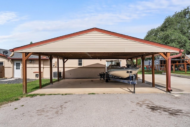 1307 Hillcrest Dr, Granite Shoals, TX 78654 - view of car parking featuring a carport and driveway