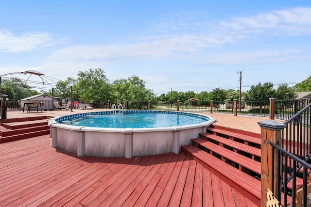 1307 Hillcrest Dr, Granite Shoals, TX 78654 - view of swimming pool with a wooden deck