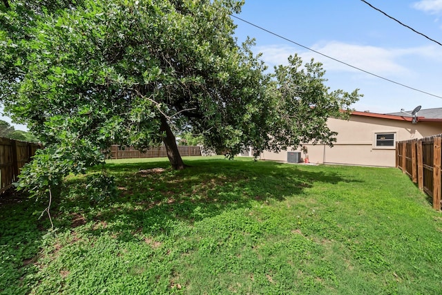 1307 Hillcrest Dr, Granite Shoals, TX 78654 - view of yard with central AC