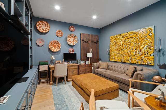 10 S Briar Hollow Ln Unit 30, Houston, TX 77027 - living room with light wood-style floors and recessed lighting