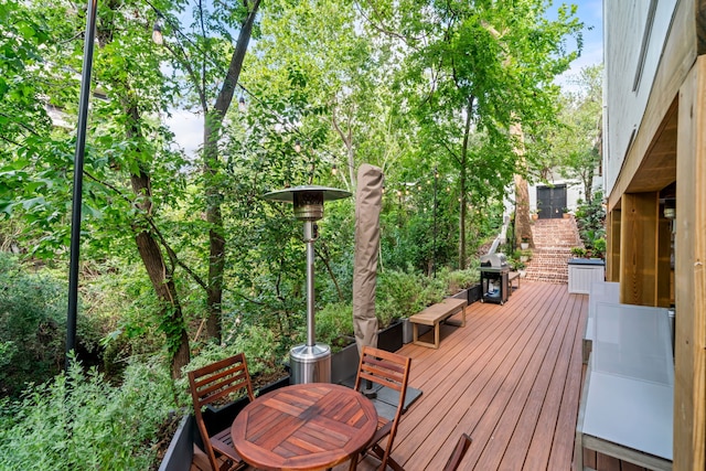 10 S Briar Hollow Ln Unit 30, Houston, TX 77027 - deck featuring grilling area and stairs