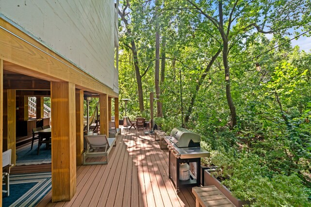 10 S Briar Hollow Ln Unit 30, Houston, TX 77027 - wooden terrace with outdoor dining space and a grill