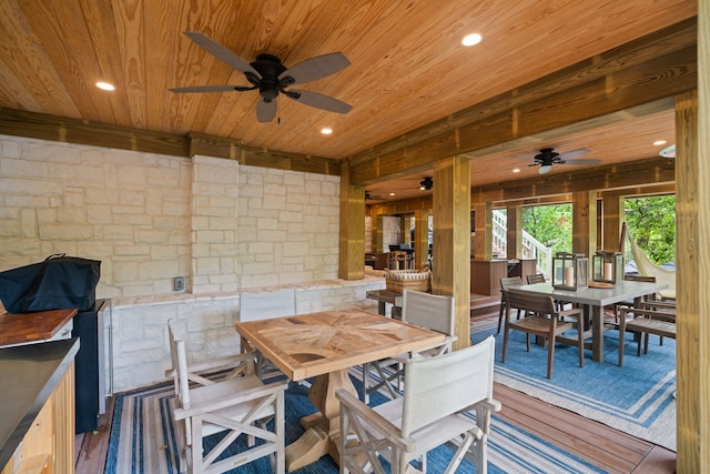 10 S Briar Hollow Ln Unit 30, Houston, TX 77027 - dining room with wood ceiling, a ceiling fan, wood finished floors, recessed lighting, and wooden walls
