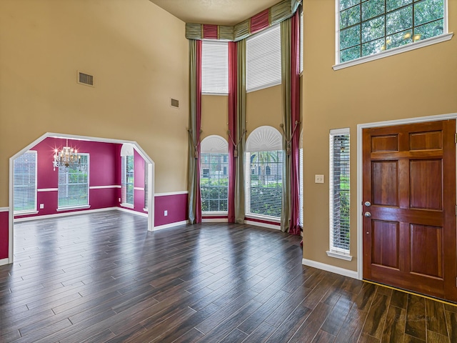 15510 Tysor Park Ln, Houston, TX 77095 - foyer entrance with a towering ceiling, a chandelier, baseboards, and wood finished floors