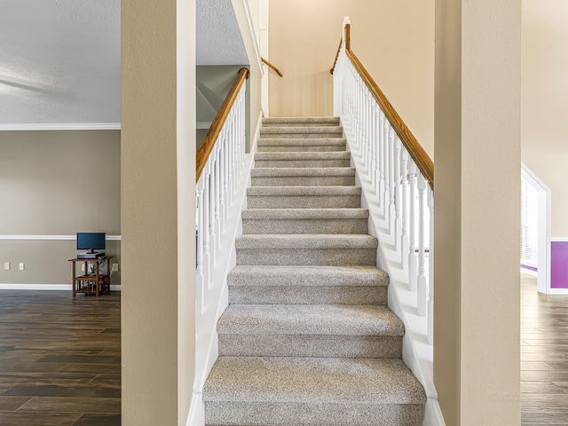 15510 Tysor Park Ln, Houston, TX 77095 - staircase with wood finished floors, baseboards, crown molding, and a textured ceiling