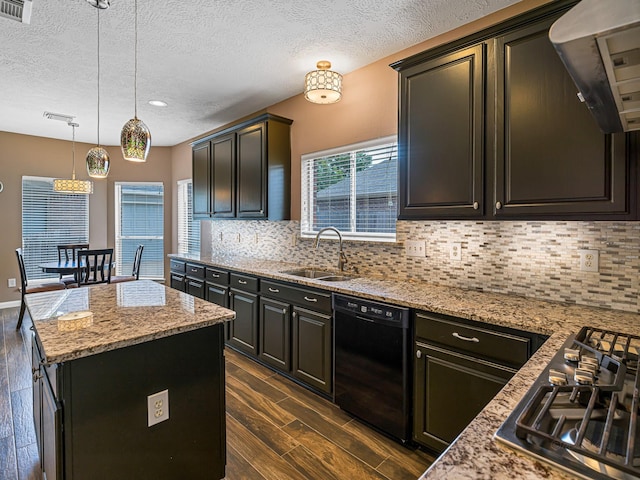 15510 Tysor Park Ln, Houston, TX 77095 - kitchen with dishwasher, a sink, dark wood-type flooring, a kitchen island, and a textured ceiling