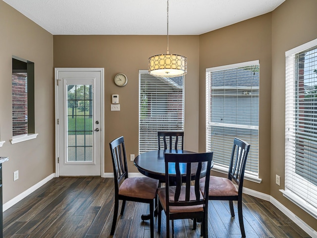 15510 Tysor Park Ln, Houston, TX 77095 - dining space featuring dark wood-style flooring and baseboards