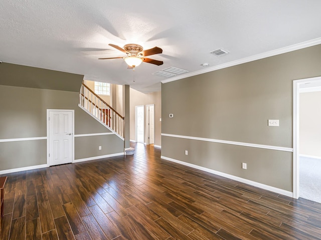 15510 Tysor Park Ln, Houston, TX 77095 - unfurnished living room featuring a ceiling fan, dark wood-style flooring, stairs, baseboards, and crown molding