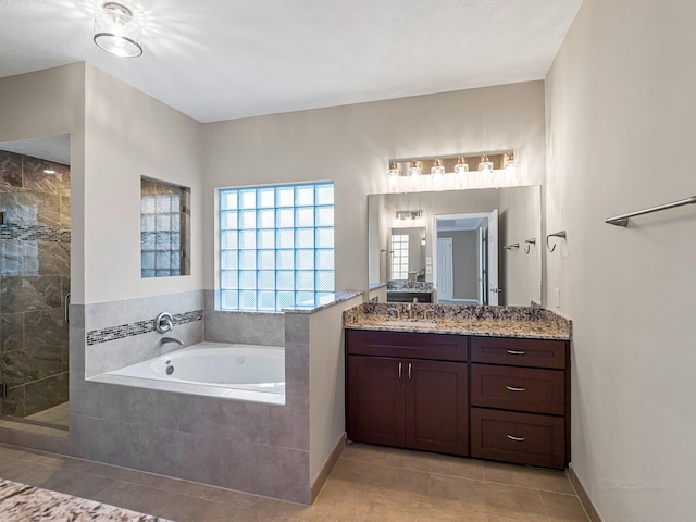 15510 Tysor Park Ln, Houston, TX 77095 - full bathroom with a bath, a shower stall, vanity, and tile patterned floors