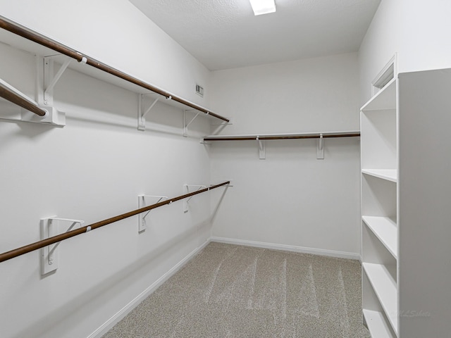 15510 Tysor Park Ln, Houston, TX 77095 - spacious closet featuring carpet flooring