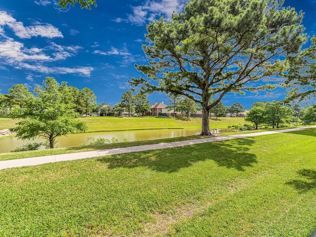 15510 Tysor Park Ln, Houston, TX 77095 - view of green lawn featuring a water view