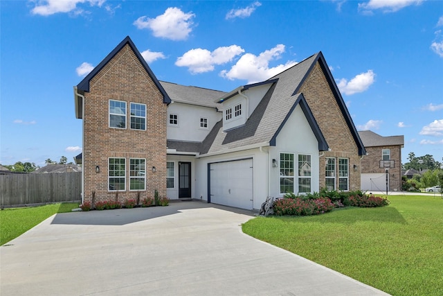 40380 Mostyn Dr, Magnolia, TX 77354 - view of front of property featuring driveway, brick siding, and roof with shingles