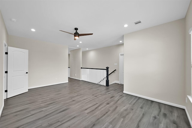 40380 Mostyn Dr, Magnolia, TX 77354 - empty room featuring wood finished floors, ceiling fan, recessed lighting, and baseboards