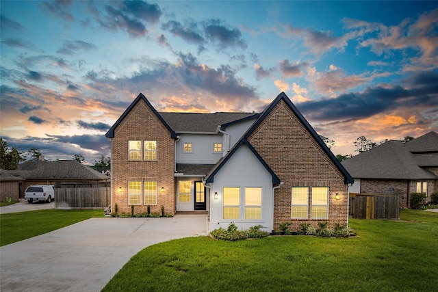 40380 Mostyn Dr, Magnolia, TX 77354 - view of front of property with brick siding, driveway, and stucco siding