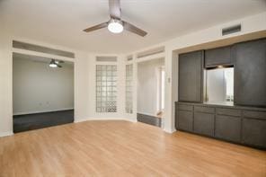 5502 Dumfries Dr, Houston, TX 77096 - unfurnished living room with ceiling fan and light wood-type flooring