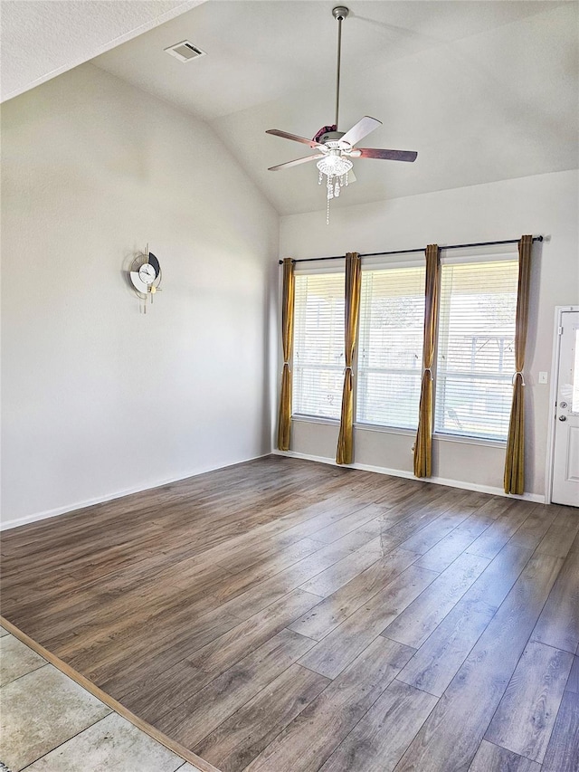 3519 Rossini Dr, Katy, TX 77493 - spare room featuring hardwood / wood-style flooring, lofted ceiling, ceiling fan, and baseboards