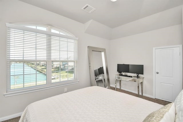 3519 Rossini Dr, Katy, TX 77493 - carpeted bedroom with baseboards and vaulted ceiling
