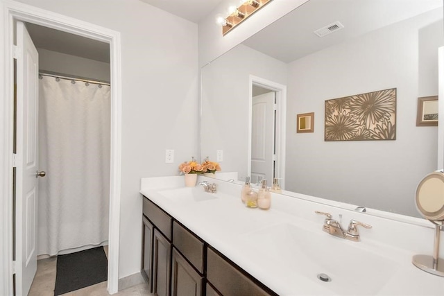 3519 Rossini Dr, Katy, TX 77493 - full bathroom with double vanity
