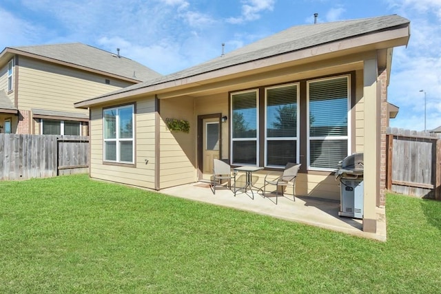 3519 Rossini Dr, Katy, TX 77493 - back of house with a patio area
