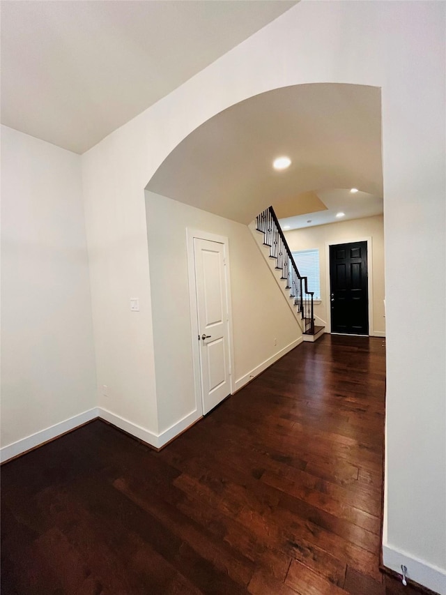 1840 Parana Dr, Houston, TX 77080 - interior space with hardwood / wood-style floors, stairway, baseboards, arched walkways, and recessed lighting