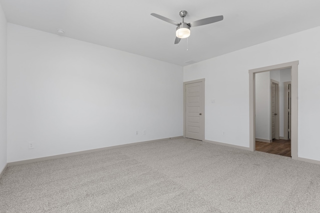 407 Emma St, Angleton, TX 77515 - carpeted empty room with a ceiling fan and baseboards