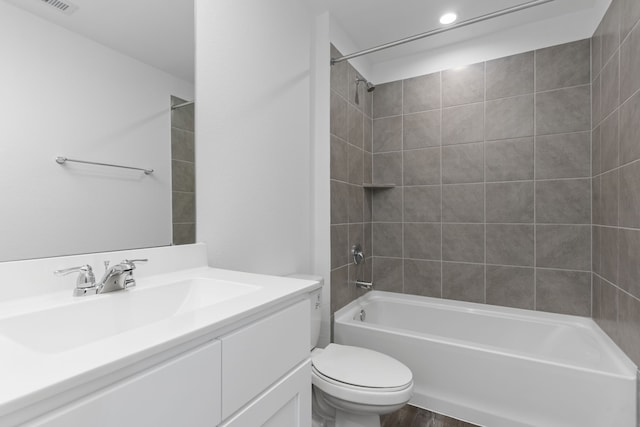 407 Emma St, Angleton, TX 77515 - bathroom featuring shower / washtub combination, toilet, vanity, and recessed lighting