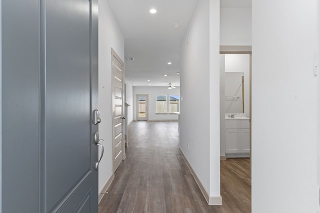 407 Emma St, Angleton, TX 77515 - hall with wood finished floors, recessed lighting, and baseboards