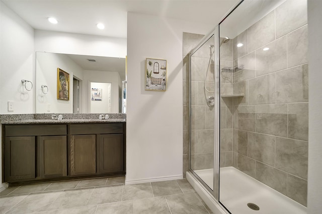 1023 Cattle Chute Ct, Rosharon, TX 77583 - bathroom featuring a stall shower, double vanity, baseboards, tile patterned floors, and recessed lighting