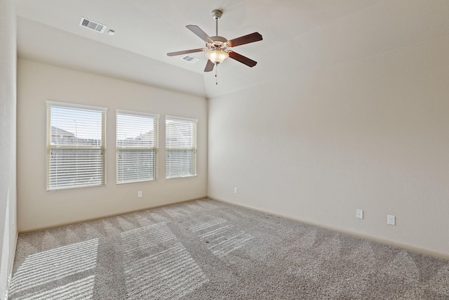 5207 Corbridge Glen Ct, Katy, TX 77449 - empty room with carpet floors, a ceiling fan, lofted ceiling, and baseboards