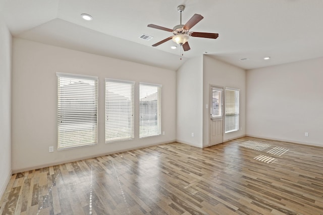 5207 Corbridge Glen Ct, Katy, TX 77449 - spare room with healthy amount of natural light, vaulted ceiling, wood finished floors, a ceiling fan, and recessed lighting