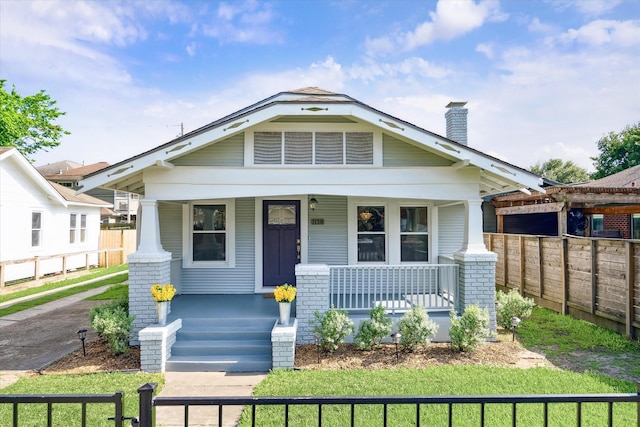 1130 Merrill St, Houston, TX 77009 - view of front of property featuring a porch and a chimney