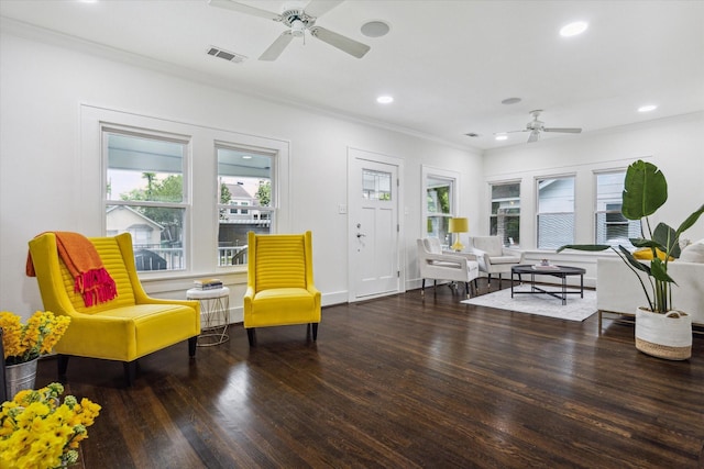 1130 Merrill St, Houston, TX 77009 - sitting room featuring ceiling fan, plenty of natural light, wood finished floors, crown molding, and recessed lighting