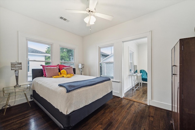1130 Merrill St, Houston, TX 77009 - bedroom featuring wood finished floors, baseboards, and a ceiling fan