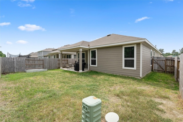 4007 Mossy Banks Ln, Houston, TX 77068 - rear view of house with a patio