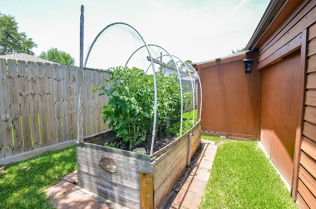 12023 Scottsdale Dr, Meadows Place, TX 77477 - view of yard featuring a garden