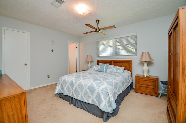12023 Scottsdale Dr, Meadows Place, TX 77477 - bedroom featuring light colored carpet and a textured ceiling