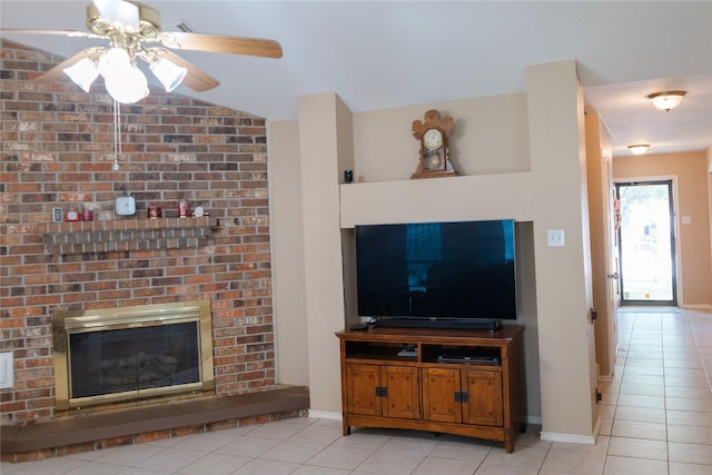 6014 Ghana Ln, Pasadena, TX 77505 - living room with light tile patterned flooring, a fireplace, ceiling fan, and baseboards