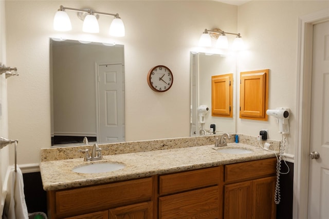 6014 Ghana Ln, Pasadena, TX 77505 - bathroom featuring double vanity